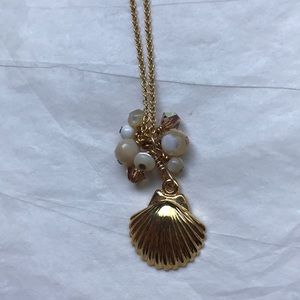 Gold seashell necklace with gem stones & crystals